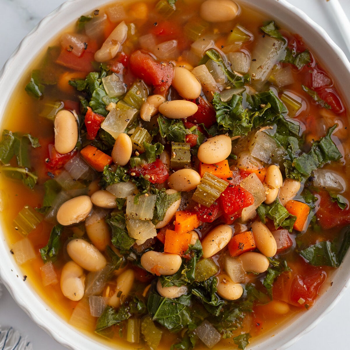 big bowl of White Bean and Kale Tuscan Soup