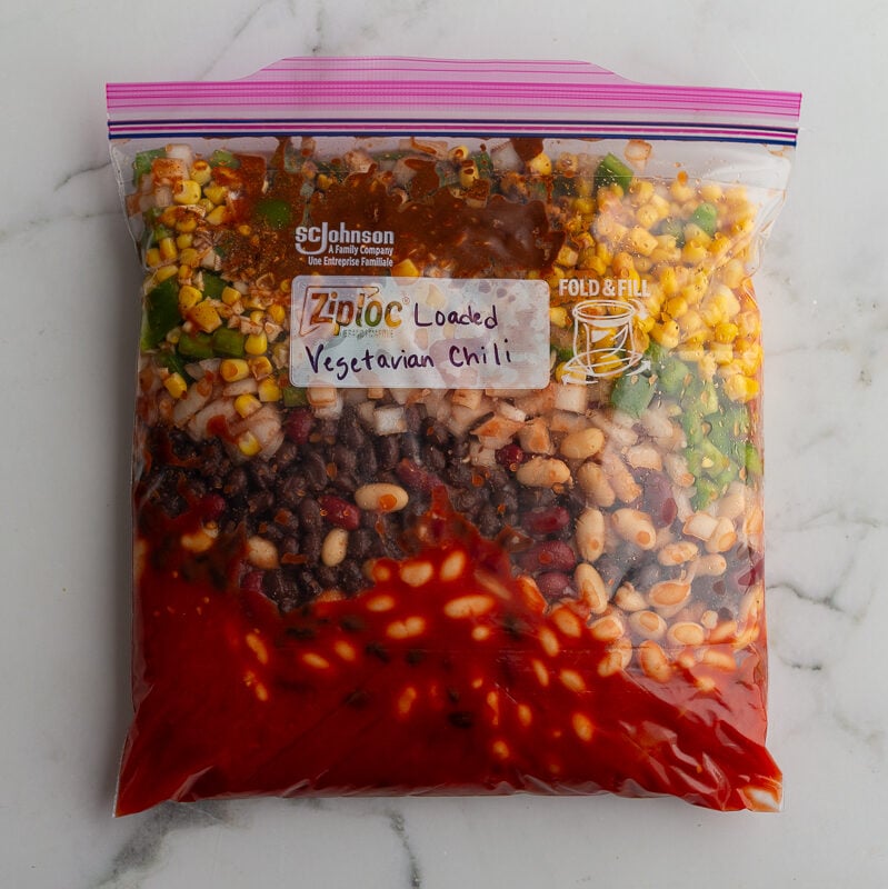 freezer bag labeled with "Loaded Vegetarian Chili" and stuffed with ingredients to make Loaded Vegetarian Chili