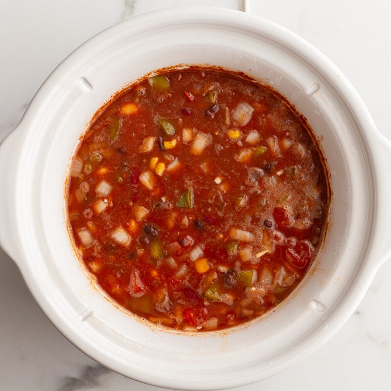 slow cooker filled with Loaded Vegetarian Chili